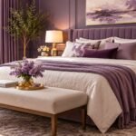 Elegant purple bedroom ideas featuring muted plum walls, a velvet upholstered bed, layered lavender bedding, warm wood furniture, and brass lighting.